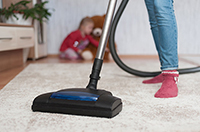 vacuum the carpet