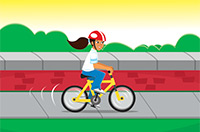 riding her bicycle